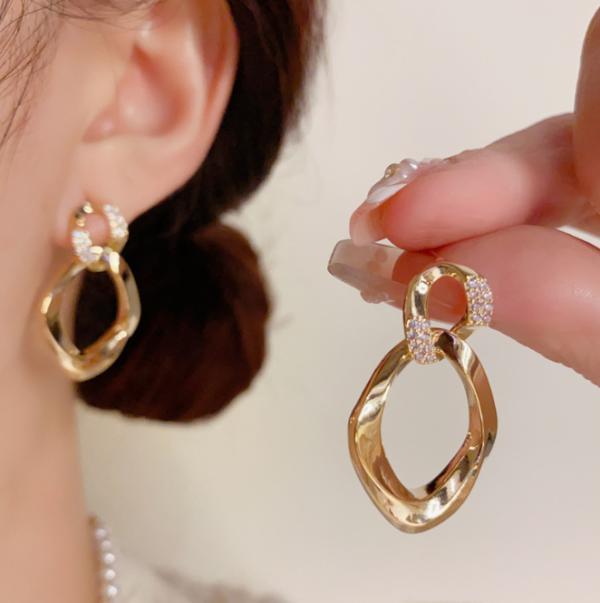 Fashionable diamond studded metal geometric earrings